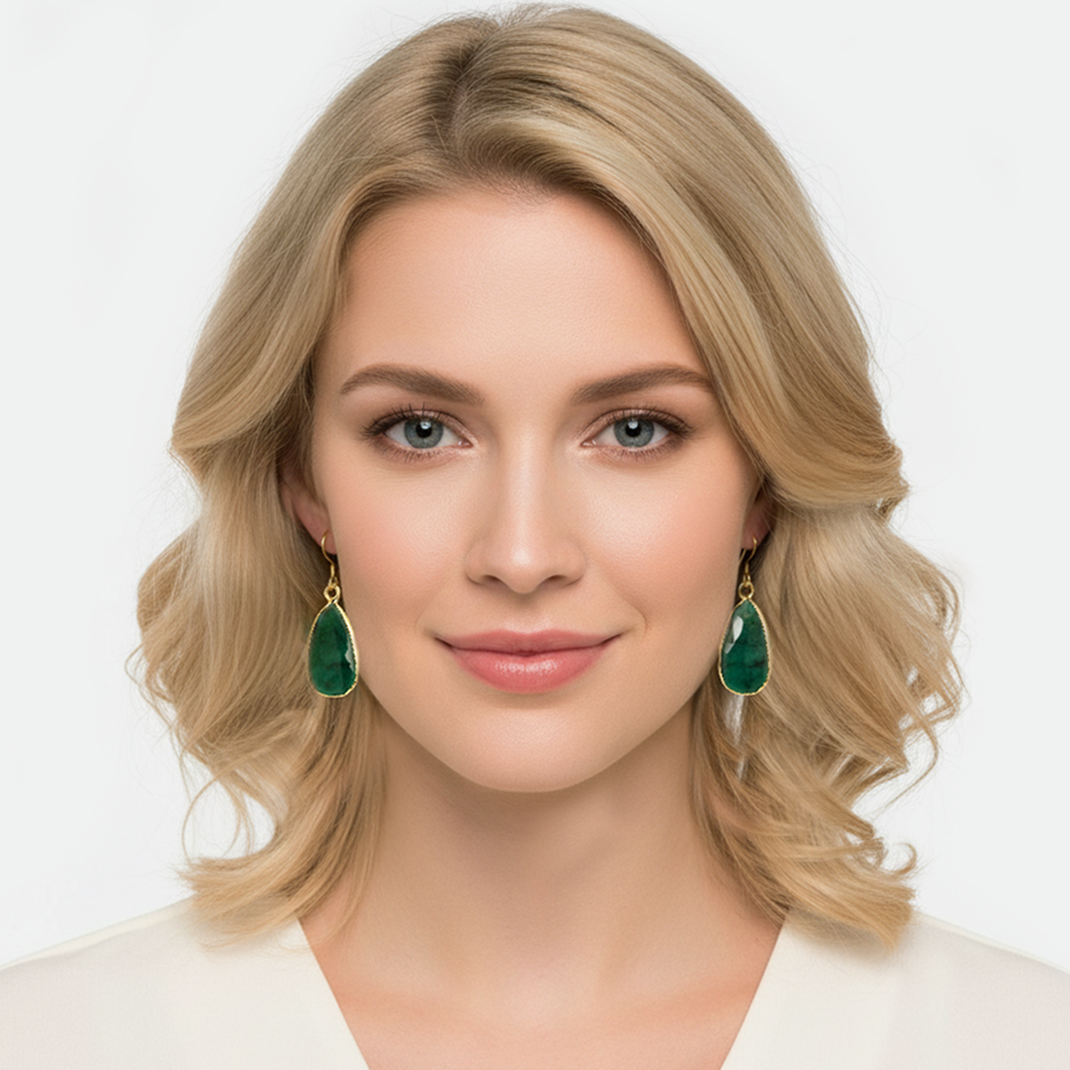 "Elegant Emerald Dangle Earrings for a Touch of Green on Your Big Day"